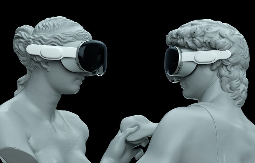 Two statues with VR glasses look at each other