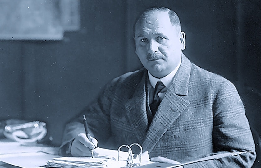 Hans Bredow at a desk